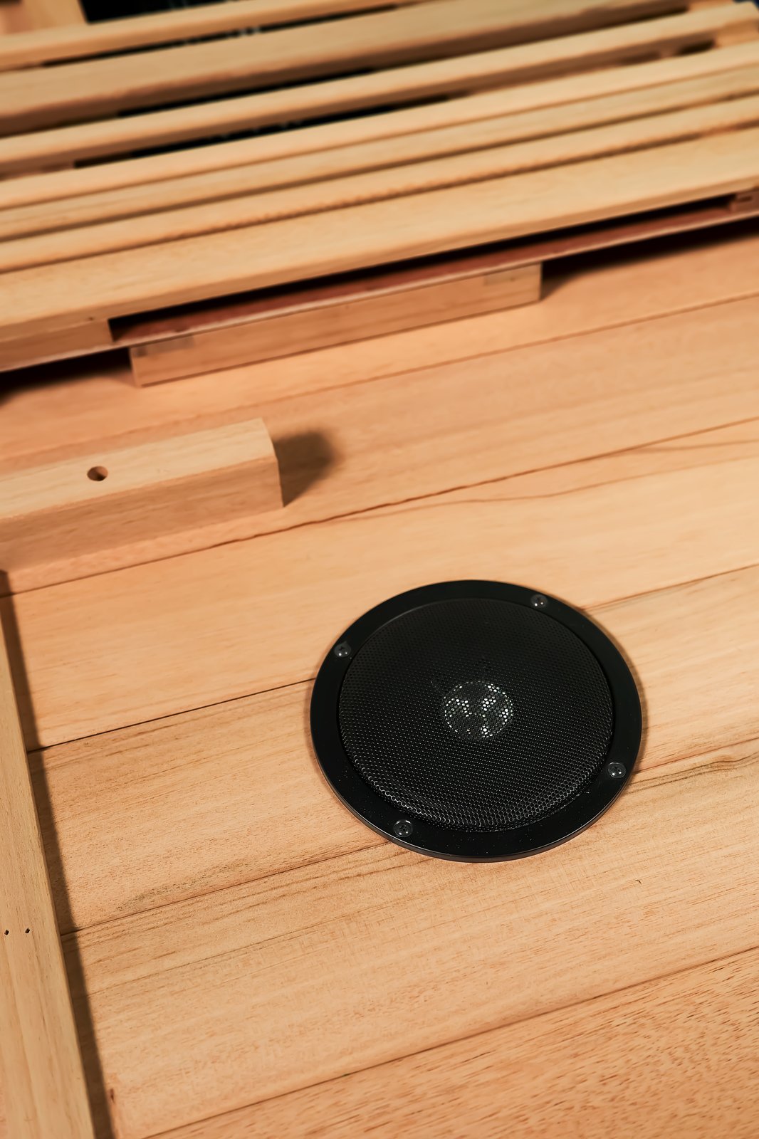 Built-in Bluetooth speaker integrated into the sauna bench